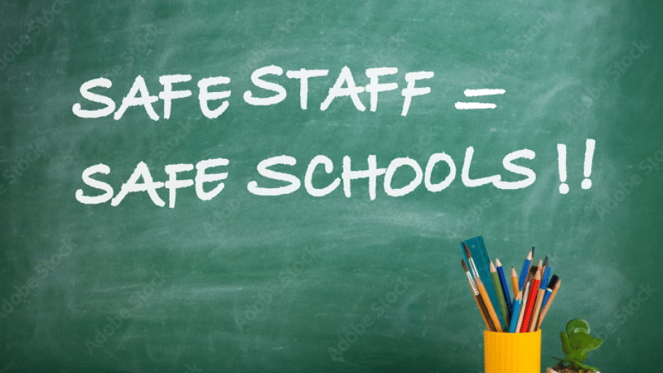 "Safe Staff = Safe Schools!!" written on a green chalk board