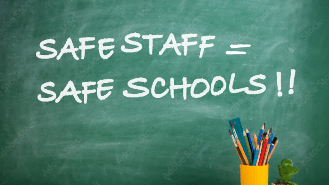 "Safe Staff = Safe Schools!!" written on a green chalk board